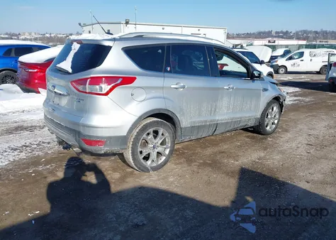 2015 Ford Escape Titanium z USA, uszkodzony, nr VIN 1FMCU9J96FUA02531